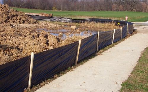 Silt fence being used to control erosion