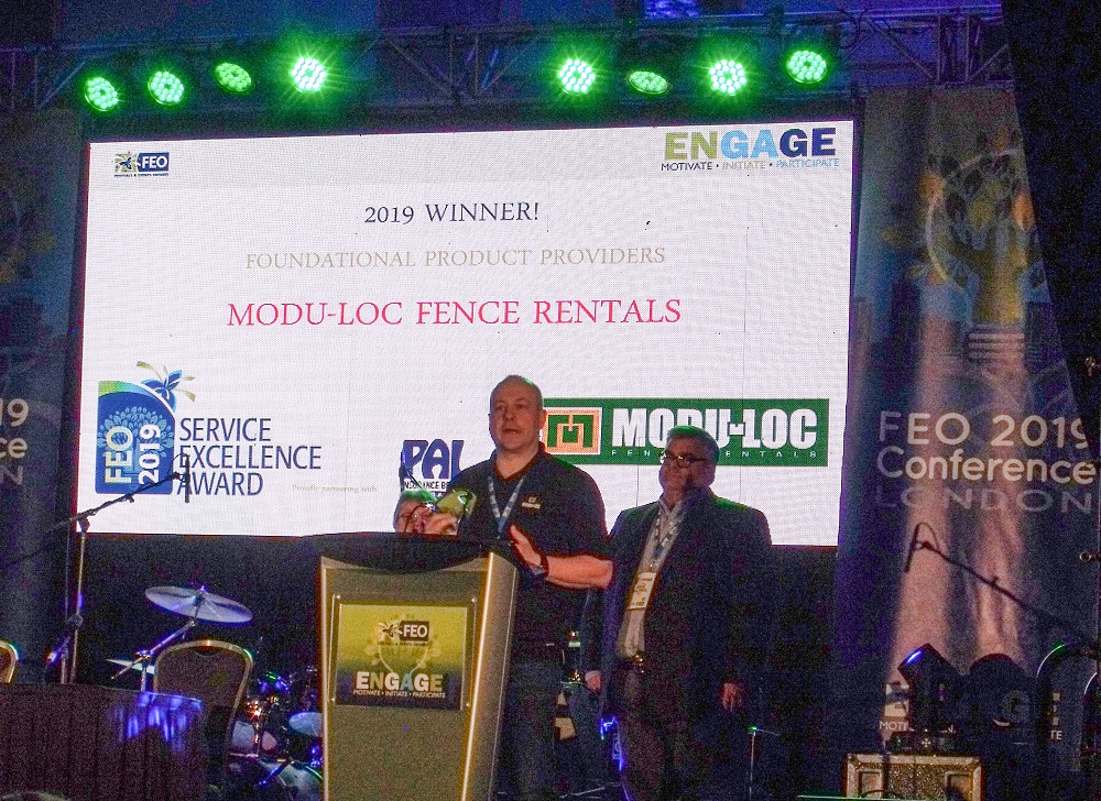 Darren Armstrong accepts the FEO Service Excellence Award on behalf of Modu-Loc