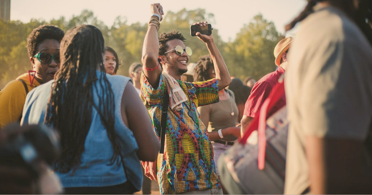 Group of people dancing outdoors