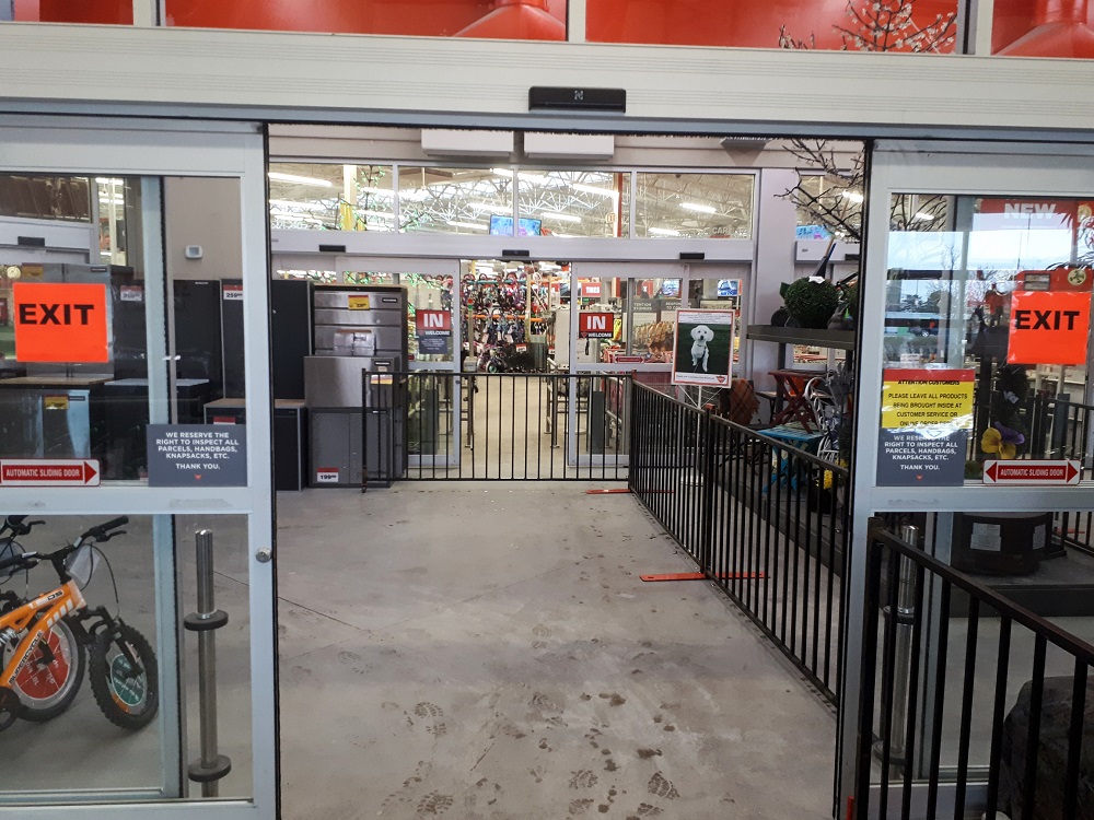 A photo of temporary fence used to manage shopper flow inside a store