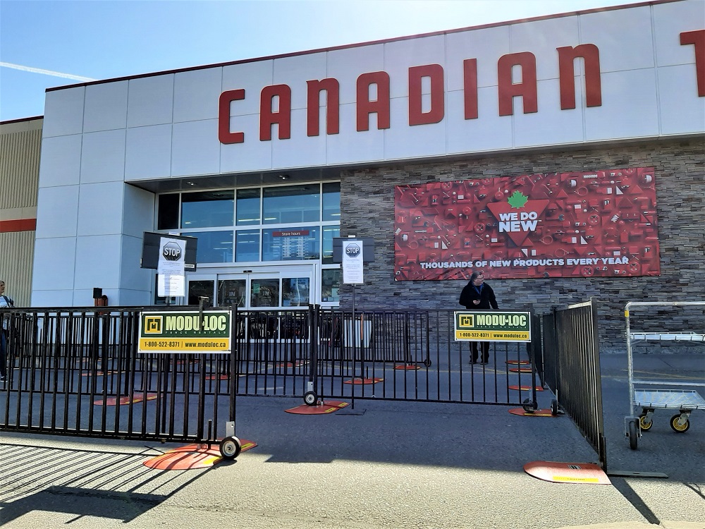 A photo of temporary fence with gates used as for retail queue management