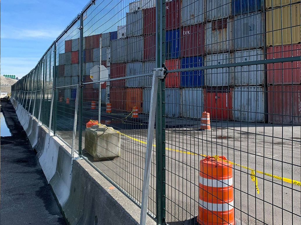 Fence on Jersey Barrier System